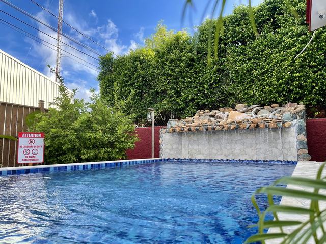 Central City Haven private pool with waterfall
